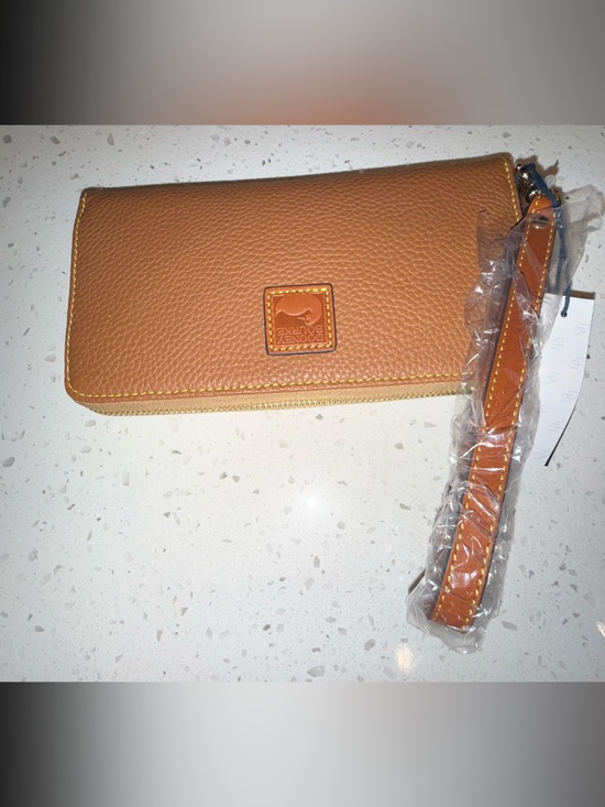 Dooney & Bourke Handbags - Dooney and Burke Pebble Grain Large Ziparound Wristlet NWT Tan